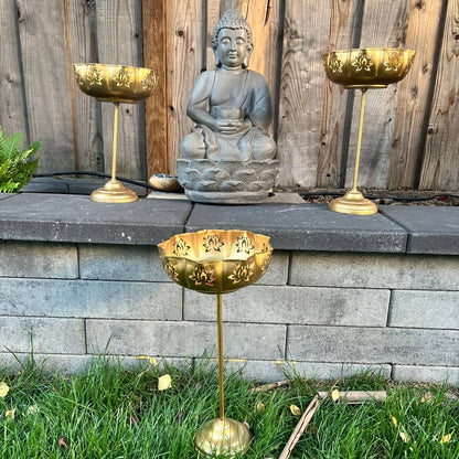 Gold Lotus Motif Urli Set by Urli Utsav Decor — standing bowls styled around Buddha statue for puja, Diwali and meditation corners