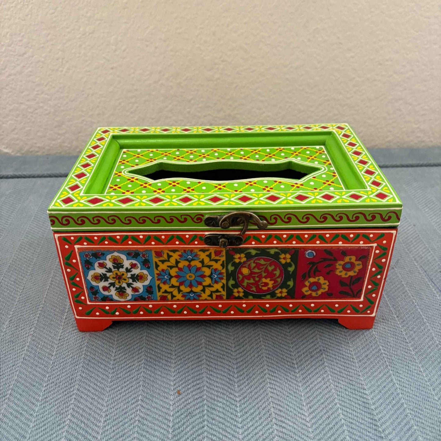 Green and red handpainted mango wood tissue box cover, Rajasthani floral mandala design, top view