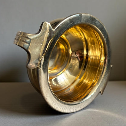 Top view of shiny brass interior of mini urli bowl – handcrafted pooja bowl design