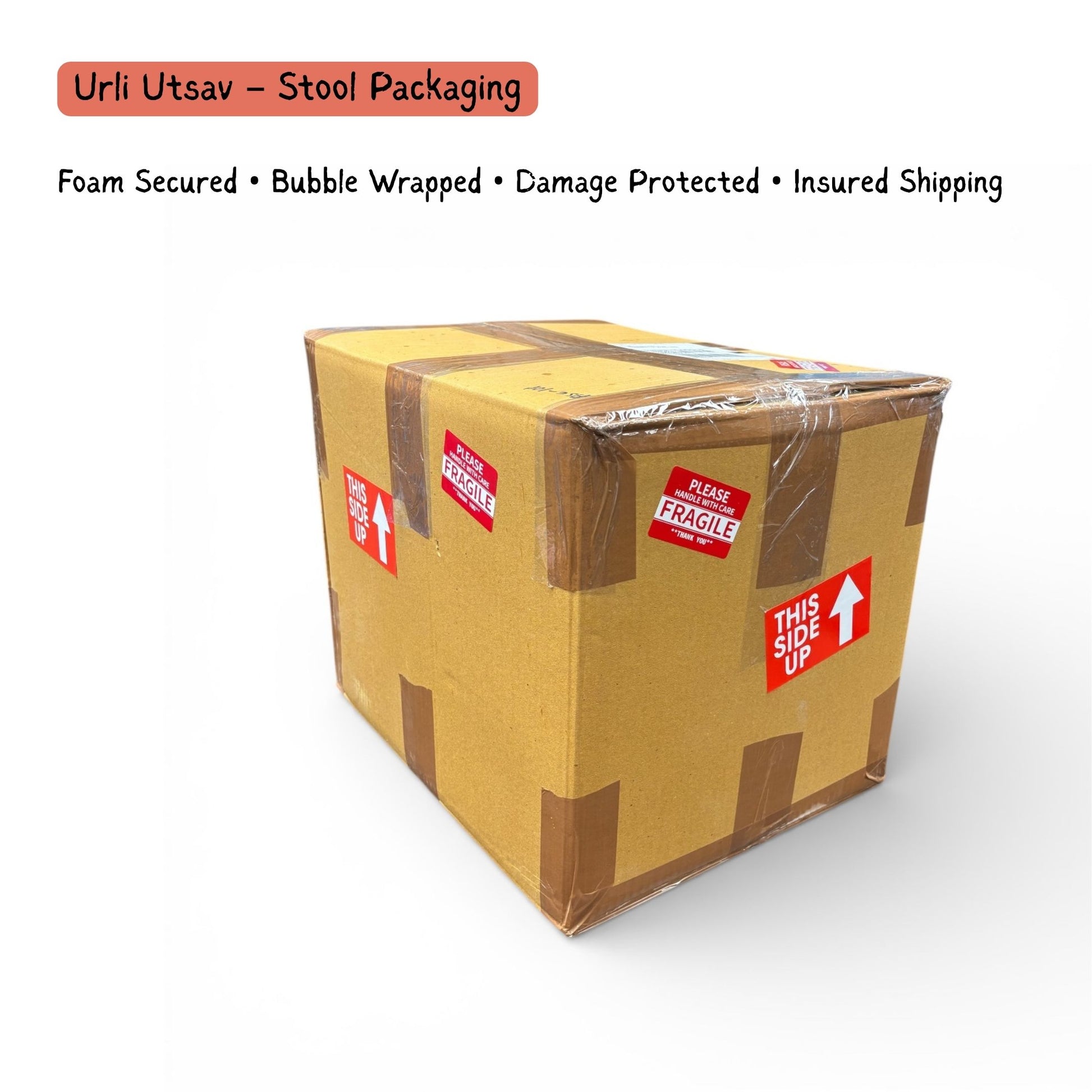 Sealed Urli Utsav shipping box for the elephant stool labeled foam secured, bubble wrapped, and fragile