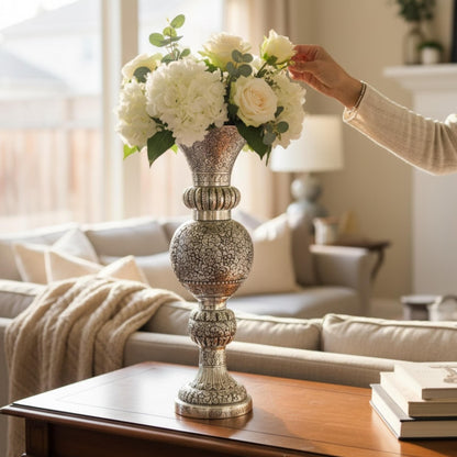 Decorative 21 inches tall silver vase with flowers in living room