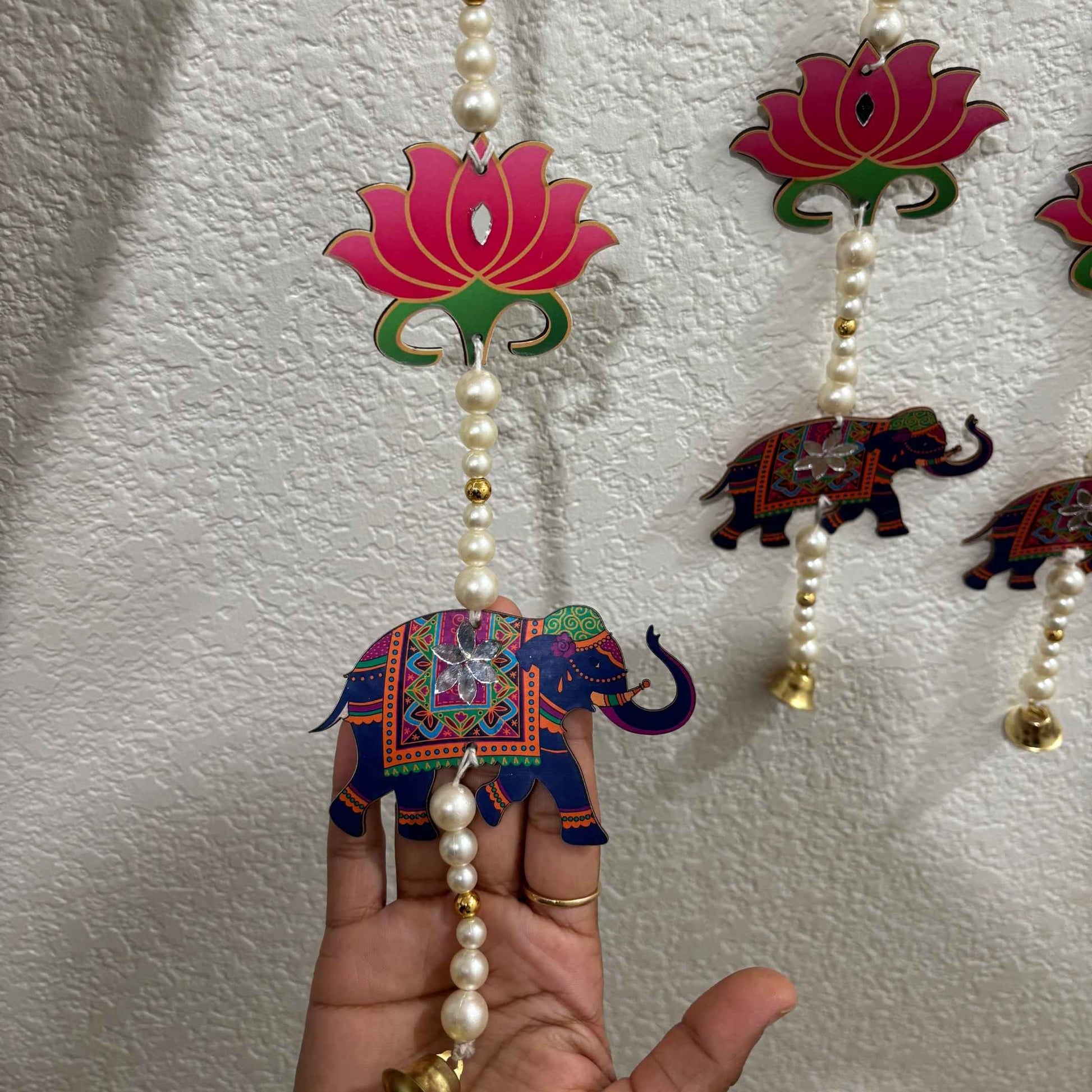 Vibrant elephant and lotus motif wall hanging for festive occasions