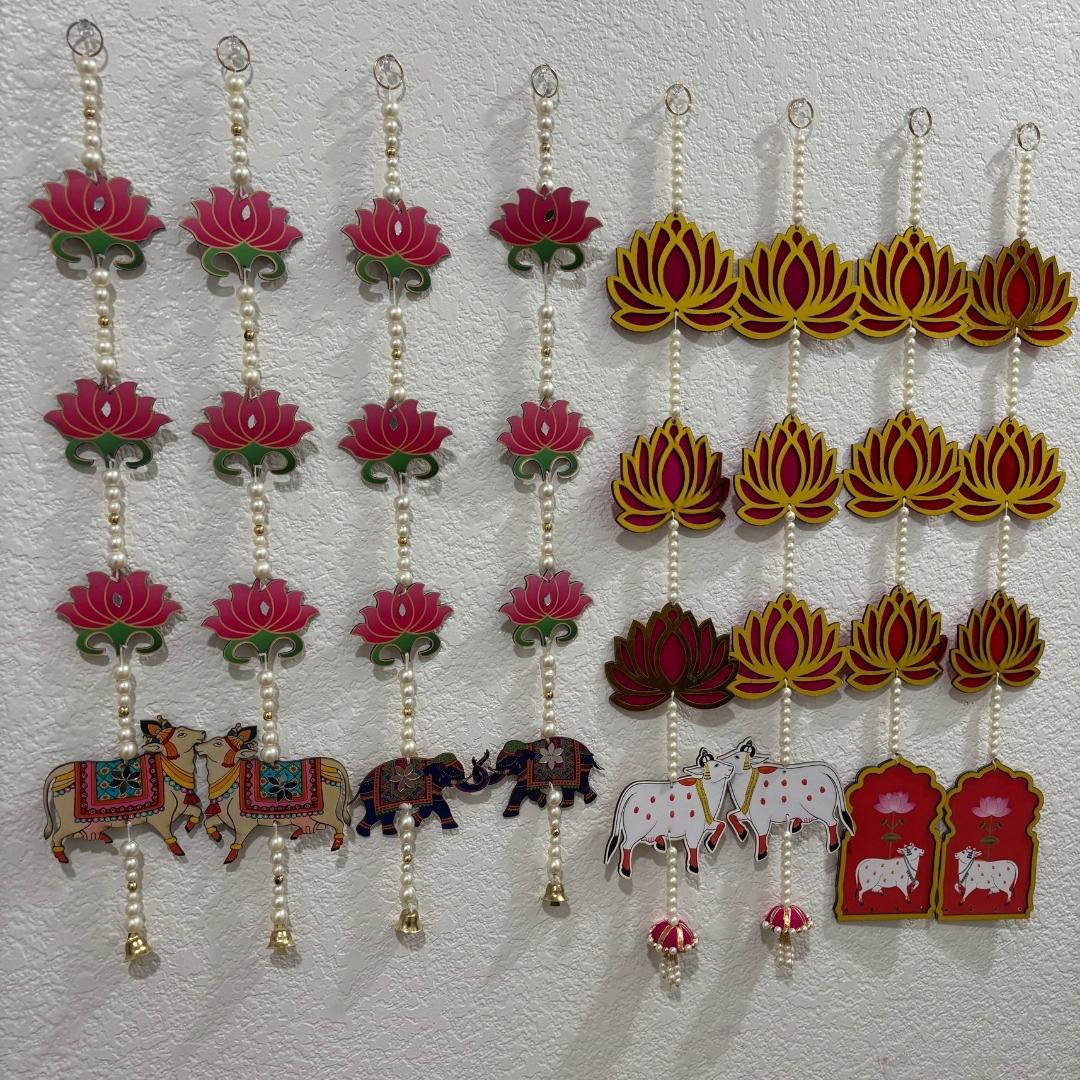 Ethnic garland featuring floral and animal motifs for wedding backdrop