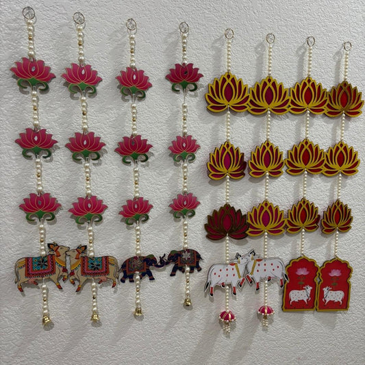 Ethnic garland featuring floral and animal motifs for wedding backdrop