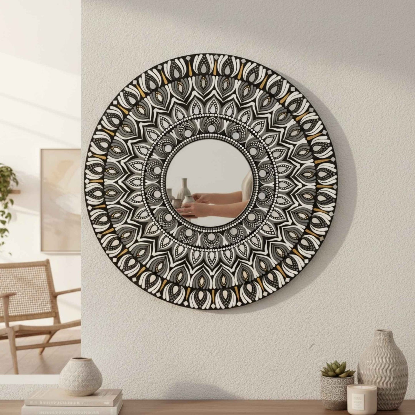 2ft round mandala mirror with intricate patterns on a wall in a room.