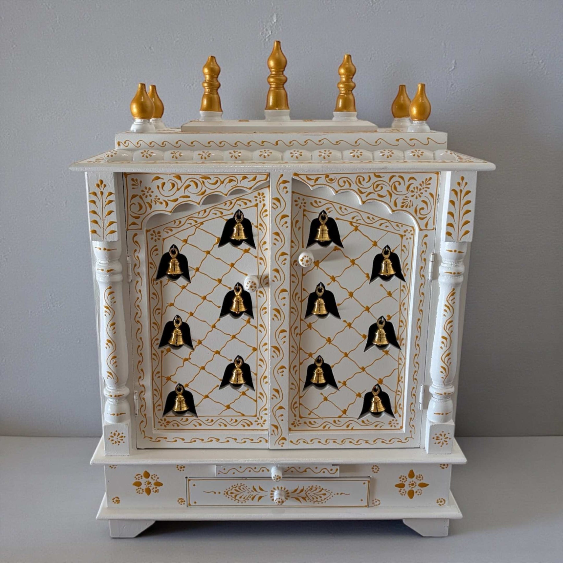 30x24x12-inch wooden pooja mandir in white and gold finish with hanging brass bells, perfect for home temple decor