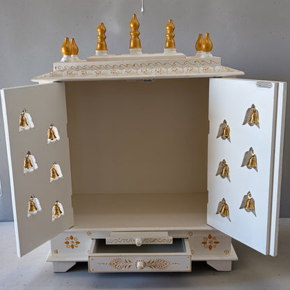 White Temple with Brass Bells & Doors - Interior view of the white and gold temple with ample space for idols and decorative items